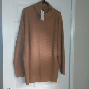 Plus camel colored turtleneck sweater